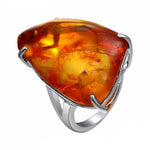 Barnsteen oranje ring