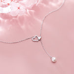 Ketting met parels en hartjes