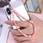 Telefoon ketting met roze kralen