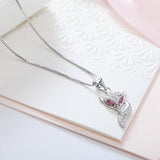 Vos ketting met roze ogen