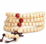 Witte houten kralenarmband